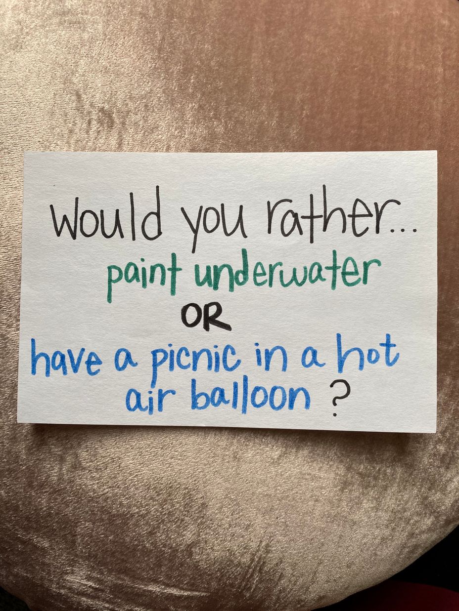 <p>Would you rather paint underwater or picnic in a hot air balloon?</p>