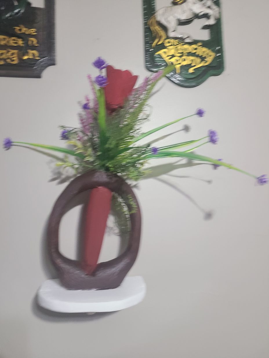 <p>Hand carved flower arrangement</p>